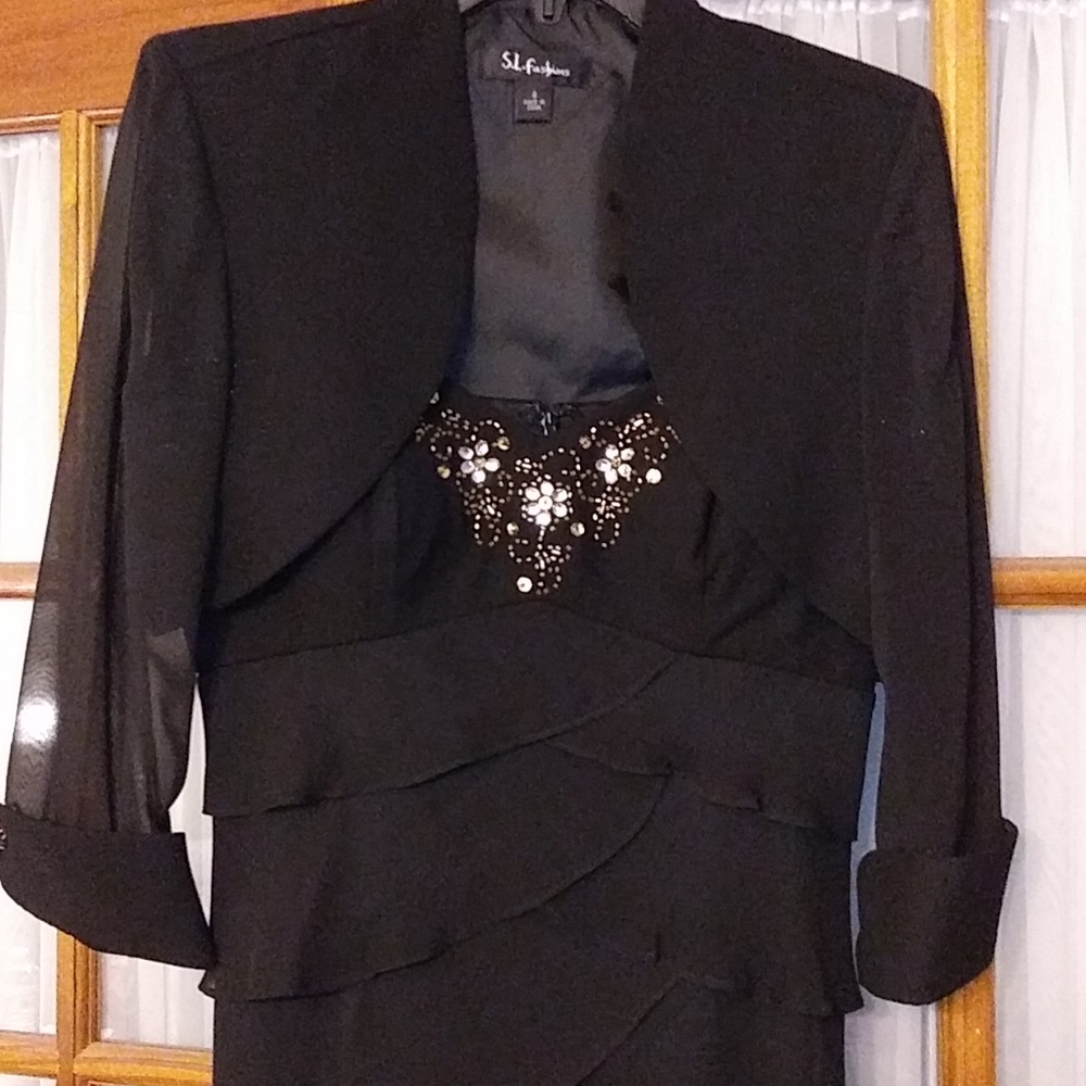 Knee length dress with removable jacket